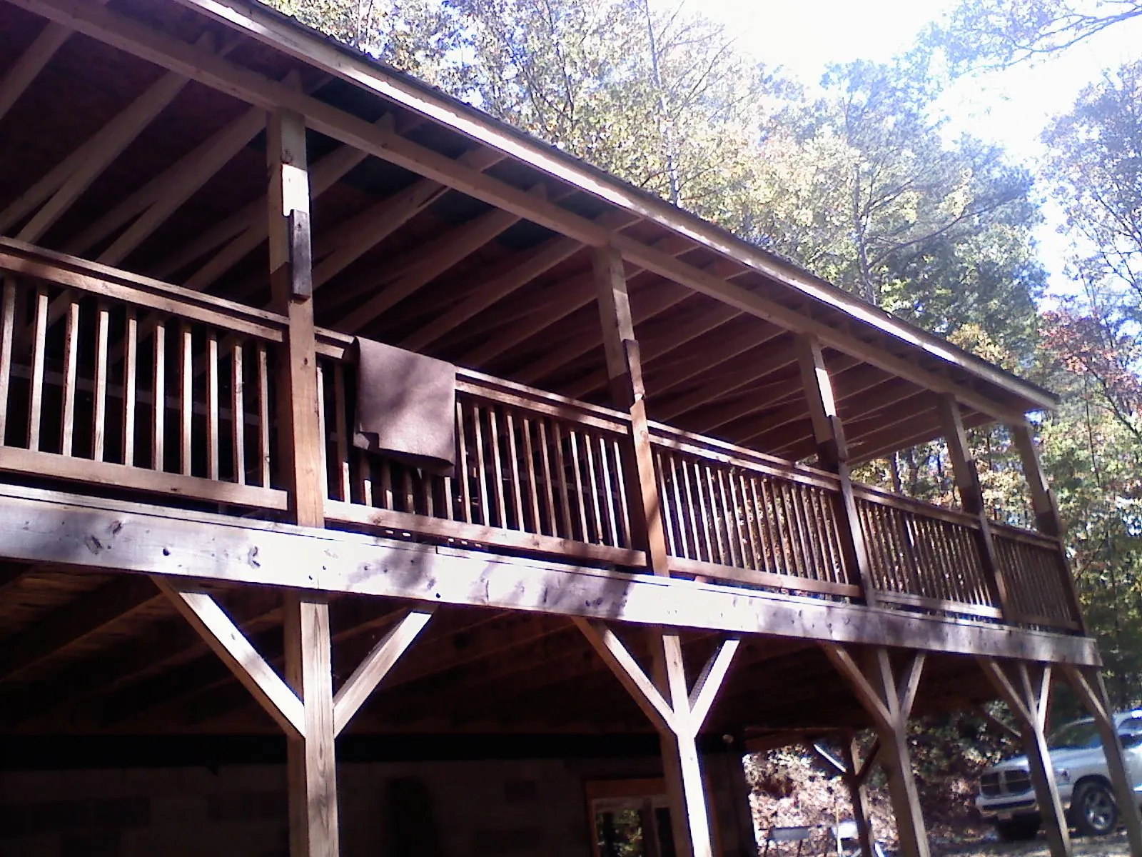 Timber framing under a new elevated porch and deck — Roof Leak Repair in Dryden by Roofing Brothers
